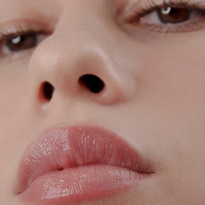 
                  
                    Load image into Gallery viewer, Close up of woman wearing lip plump with glossy lips
                  
                