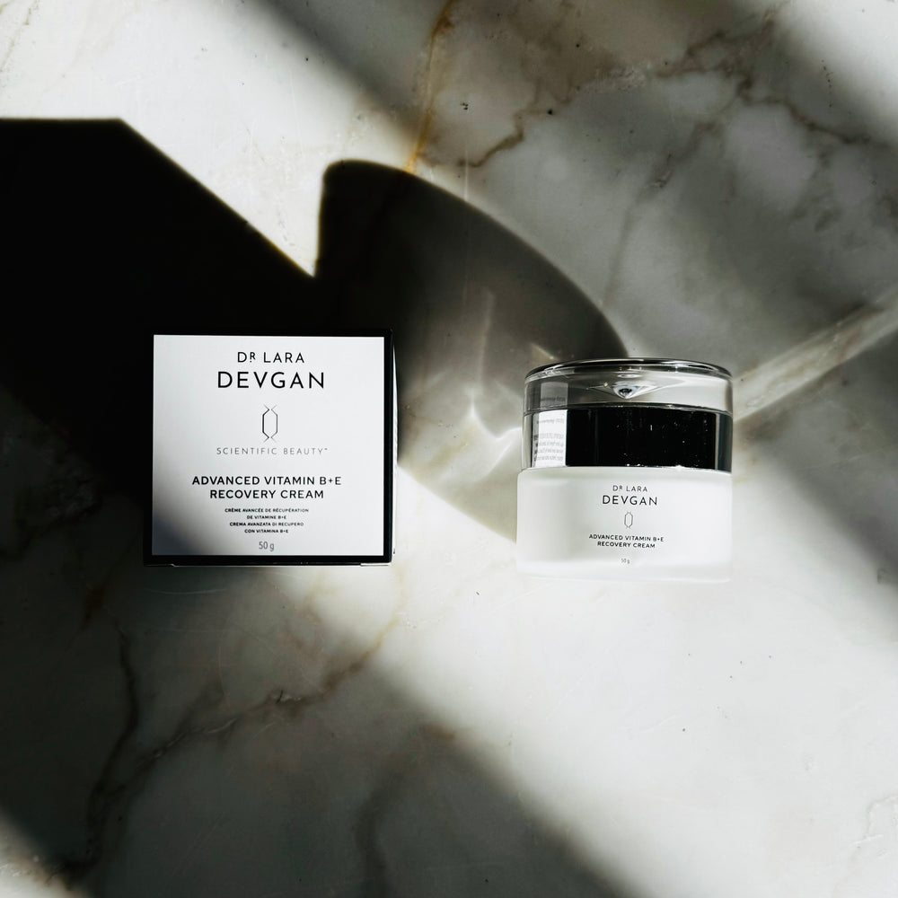 
                  
                    Load image into Gallery viewer, Dr Lara Devgan Advanced B E Recovery Cream carton and jar
                  
                
