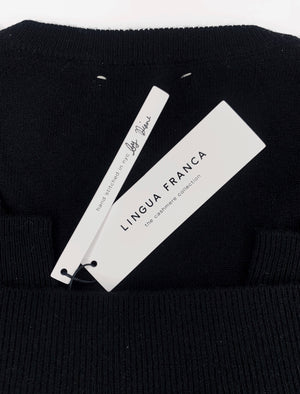 
                  
                    Load image into Gallery viewer, Black folded sweater with lingua franca tag
                  
                